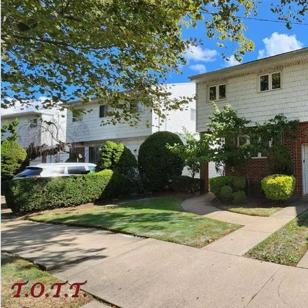Buy this 4 bed house on 279 Whitman Drive in New York, NY 11234