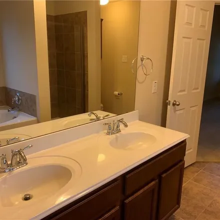 Rent this 4 bed apartment on 694 Rolling Hills Lane in DeSoto, TX 75115