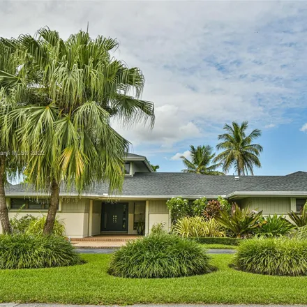 Buy this 5 bed house on 9910 East Calusa Club Drive in Lindgren Acres, Miami-Dade County