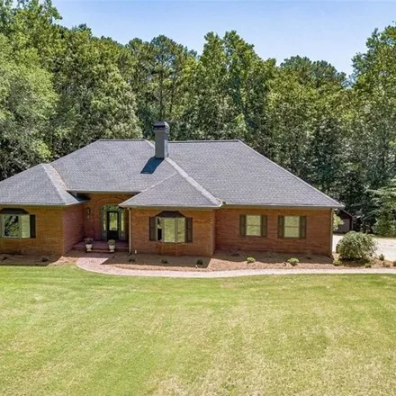 Buy this 5 bed house on 2971 Tree Top Rd in Dacula, Georgia