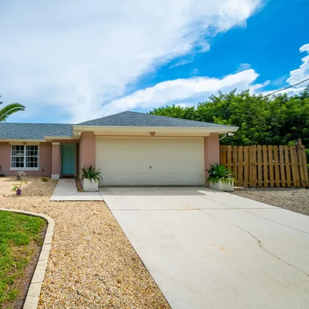 Buy this 3 bed house on 1262 Scottish Street Southwest in Palm Bay, FL 32908