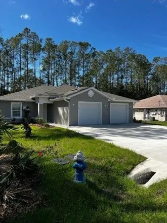 Rent this 3 bed house on 38 Ryapple Lane in Palm Coast, FL 32164