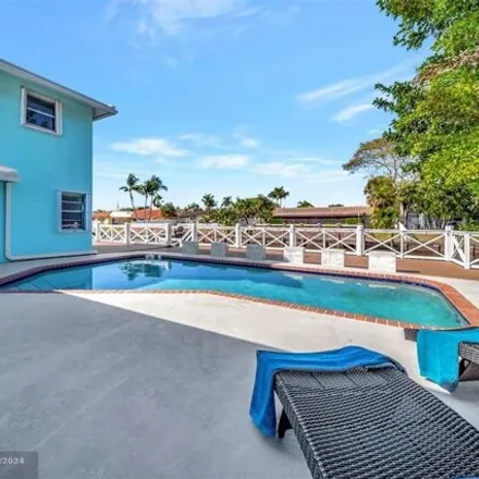 Rent this 4 bed house on 1455 Northeast 53rd Street in Coral Hills, Fort Lauderdale