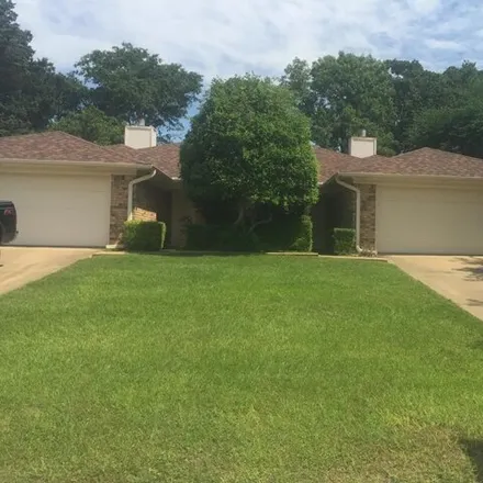 Rent this 3 bed house on 1153 East Oval Drive in Athens, TX 75751