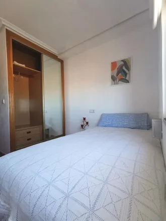 Rent this 1 bed room on Carrer de Villena / Calle Villena in 03007 Alicante, Spain