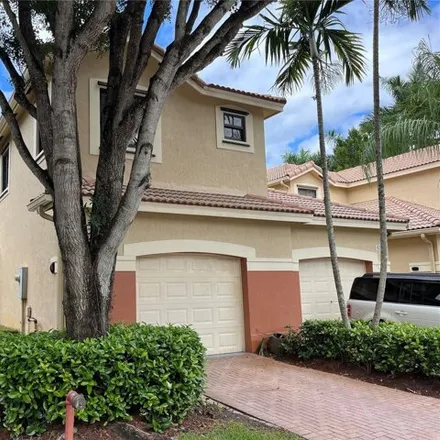 Rent this 4 bed townhouse on 4207 Vineyard Circle in Weston, FL 33332