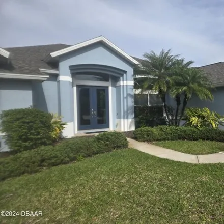 Rent this 3 bed house on 1201 Hampstead Ln in Ormond Beach, Florida