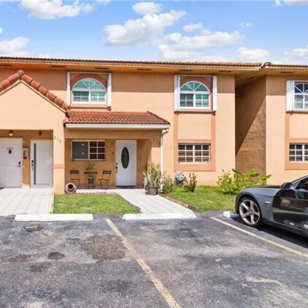 Rent this 2 bed condo on West 33rd Lane in Hialeah, FL 33018