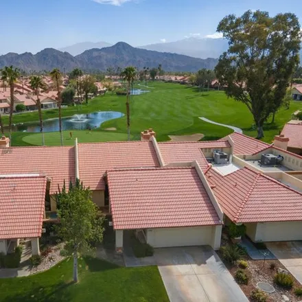 Buy this 2 bed condo on Oasis Country Club Golf Course in Faber Circle, Palm Desert