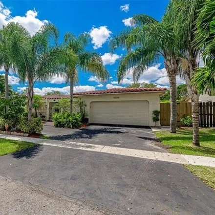 Buy this 3 bed house on 10526 Northwest 4th Street in Plantation, FL 33324