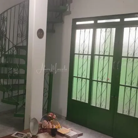 Buy this 4 bed house on Escola Municipal de Ensino Fundamental Professora Célia Guedes in Rua dos Amarantos 313, Jardim Primavera
