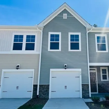 Rent this 3 bed townhouse on Garden Vine Trail in Wake County, NC