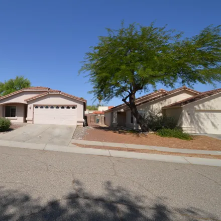 Rent this 3 bed house on 65 North Shadow Creek Place in Tucson, AZ 85748