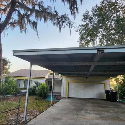 Rent this 3 bed house on 6538 Lynn Road in Orange County, FL 32810