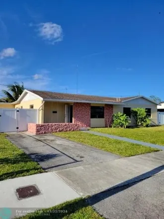 Buy this 5 bed house on 65 Northeast 214th Street in Andover Lakes Estates, Miami Gardens