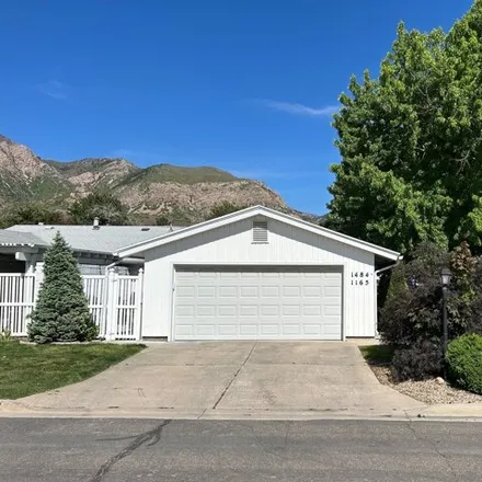 Buy this 2 bed condo on 1179 East 1475 South in Whisperwood Lotus, Ogden