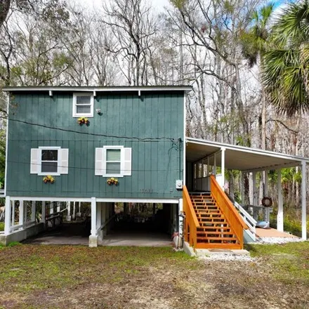 Buy this 3 bed house on Northwest 153 Court in Levy County, FL