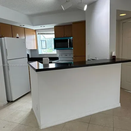 Rent this 2 bed apartment on Pinewalk Drive North in Margate, FL 33063