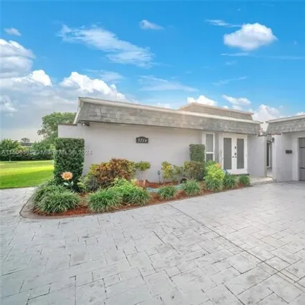 Buy this 2 bed house on 5770 Coco Palm Drive in Tamarac, FL 33319