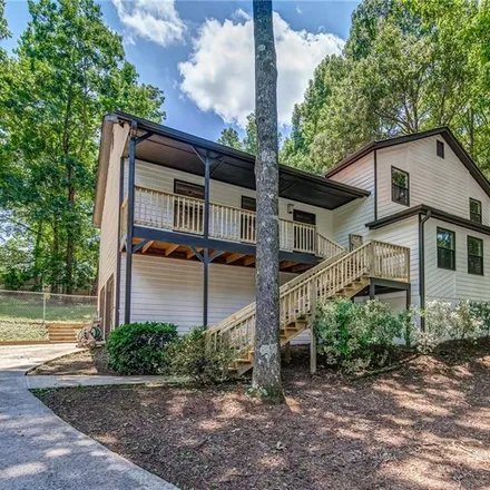 Buy this 4 bed house on 304 Park Square in Woodstock, GA 30188