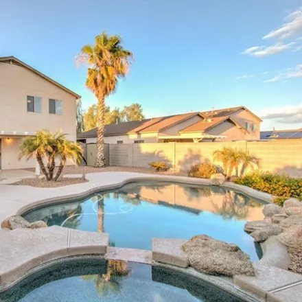Buy this 4 bed house on 1717 East Silktassel Trail in San Tan Valley, AZ 85143