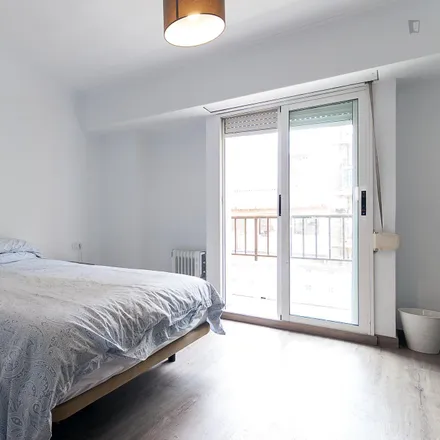 Rent this 3 bed room on El Palacio del Bebé in Carrer de la Reina, 46011 Valencia