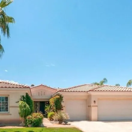 Rent this 4 bed house on 48843 Via Estacio in Indio, CA 92201