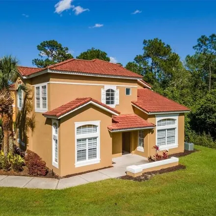 Buy this 4 bed house on 2709 Sun Key Place in Four Corners, FL 34747