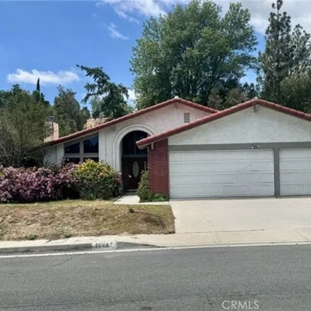 Rent this 4 bed house on 11841 Laughton Way in California, 91326