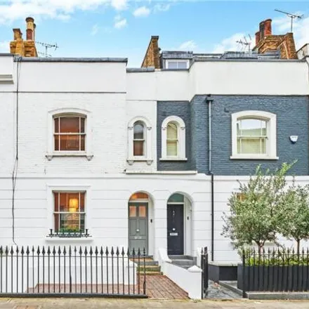 Buy this 4 bed townhouse on Fulham Town Hall in Harwood Road, London