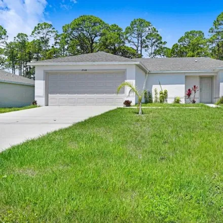 Buy this 3 bed house on De Groodt Road Southwest in Palm Bay, FL 32908