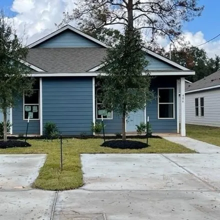 Rent this 3 bed house on 410 Avenue H in Conroe, TX 77301