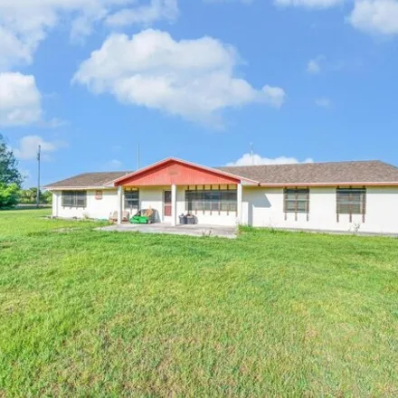 Buy this 3 bed house on 2868 Gentile Rd in Fort Pierce, Florida