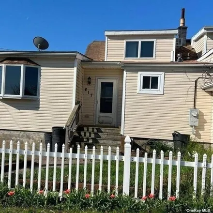 Rent this 3 bed house on 817 Ocean Street in Village of Lindenhurst, NY 11757