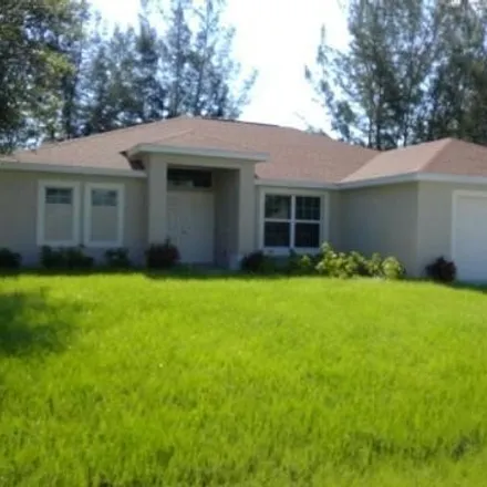 Rent this 3 bed house on 1887 Southwest 15th Place in Cape Coral, FL 33991