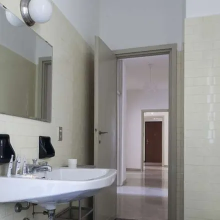 Rent this 4 bed apartment on Via Melchiorre Gioia in 20124 Milan MI, Italy