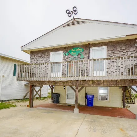 Buy this 4 bed house on 223 West Beach Drive in Oak Island, Brunswick County