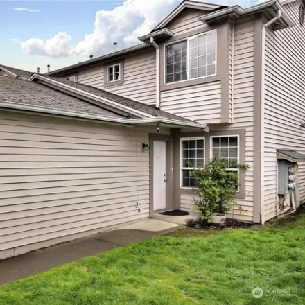 Buy this 2 bed townhouse on 6298 110th Avenue Court East in Pierce County, WA 98372