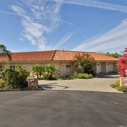 Rent this 4 bed house on 1990 Quail View Drive in San Diego County, CA 92084