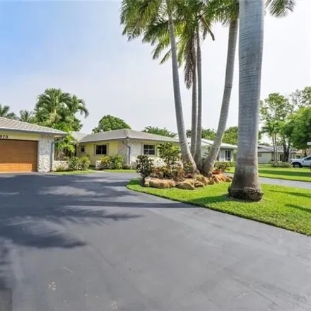 Buy this 5 bed house on 9959 Northwest 19th Street in Coral Springs, FL 33071