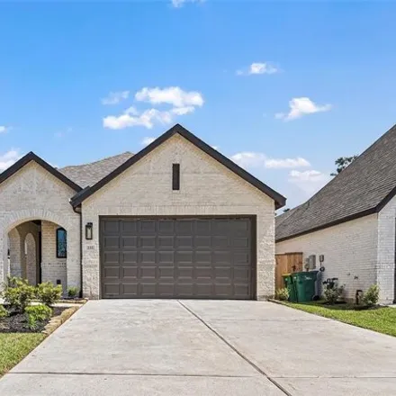 Rent this 3 bed house on Trapper Creek Drive in Conroe, TX 77301