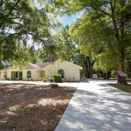 Buy this 3 bed house on 9973 NW 61 CT in Levy County, FL 32626