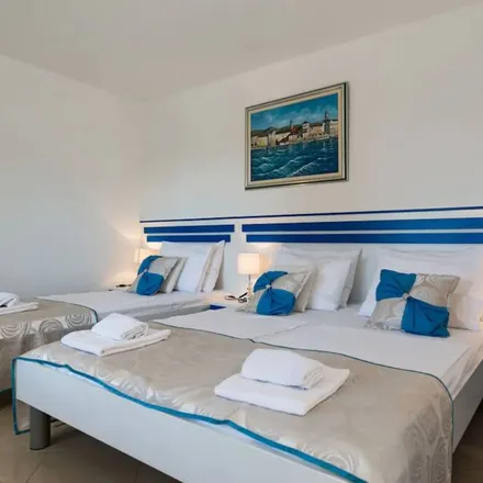 Rent this 9 bed house on 21312 Općina Podstrana