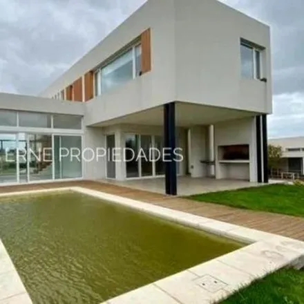Buy this 3 bed house on unnamed road in Bosque de Peralta Ramos, B7603 DRT Mar del Plata
