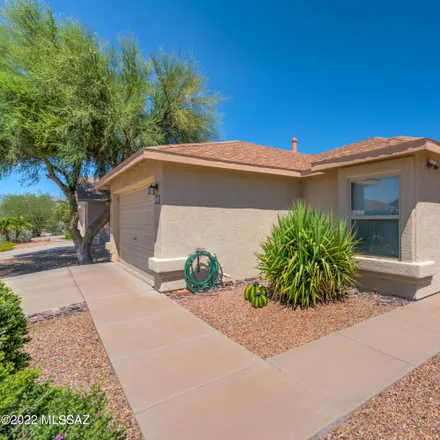 Buy this 2 bed house on 8106 East Lakeside Parkway in Tucson, AZ 85710