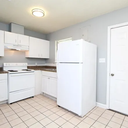 Rent this 2 bed apartment on 5873 Peachtree Street in Milton, FL 32570