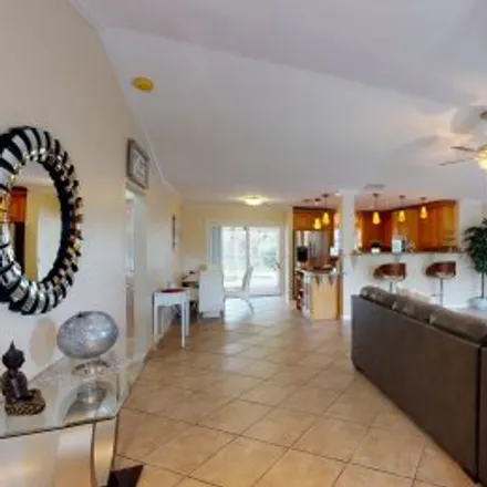 Rent this 3 bed apartment on 2919 Southwest 2Nd Place in Pelican, Cape Coral