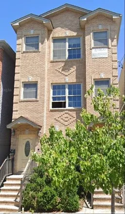 Rent this 4 bed house on 128 Irving Street in Jersey City, NJ 07307