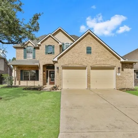 Rent this 4 bed house on 91 West Lasting Spring Drive in The Woodlands, TX 77389