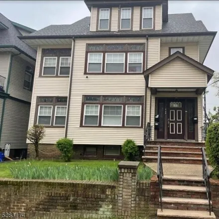 Rent this 4 bed house on 24 Mapes Avenue in Newark, NJ 07112